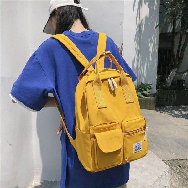 Canvas Backpack 2020 new classic simple canvas wearable and lightening college style solid color student schoolbag 